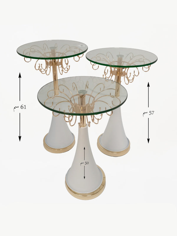 طقم طاولات زجاج مدور 3 قطع بقوائم ستيل أبيض بلمسة ذهبية / ارتفاع الأولى 61 سم _ الثانية 57 سم _ الثالثة 50 سم